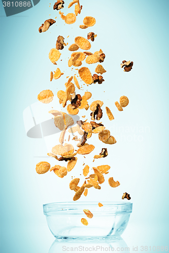 Image of The cornflakes falling with walnuts