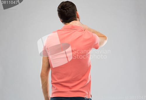 Image of man suffering from neck pain