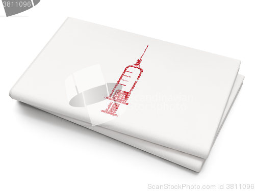 Image of Health concept: Syringe on Blank Newspaper background