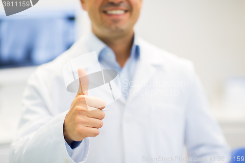 Image of close up of doctor showing thumbs up at hospital