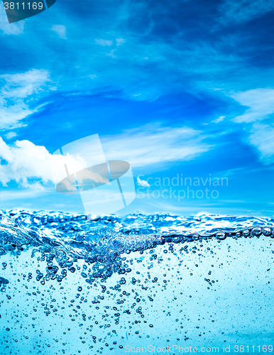 Image of Close up water on a background of blue sky