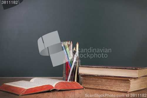 Image of School desk with blackboard