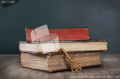 Image of Old Books and Key