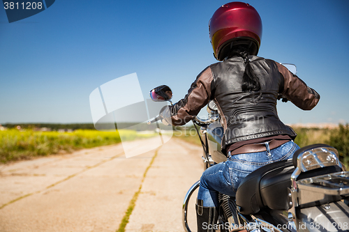 Image of Biker girl First-person view