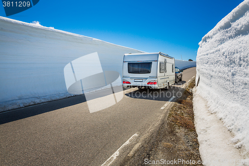 Image of Caravan car travels on the highway.