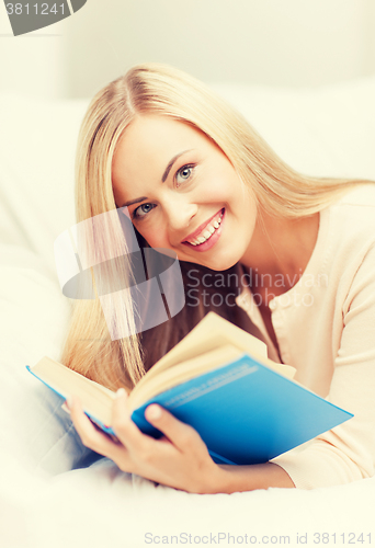 Image of woman reading book