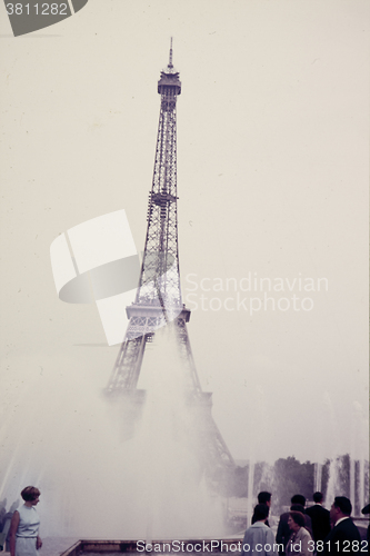 Image of Original vintage colour slide from 1960s, young woman stands ben