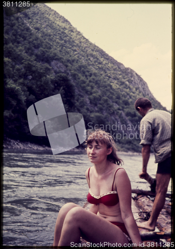 Image of Original vintage colour slide from 1960s, young woman enjoying a