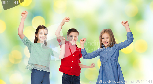 Image of happy boy and girls celebrating victory