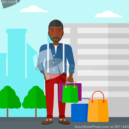 Image of Buyer with shopping bags.