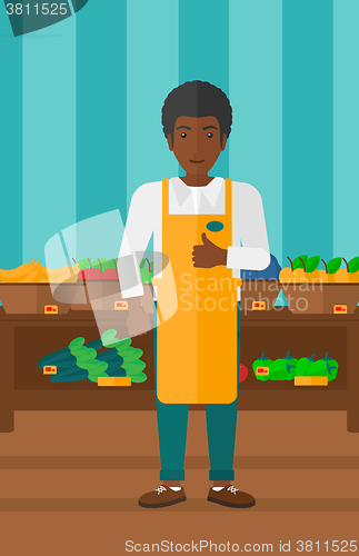 Image of Friendly supermarket worker.