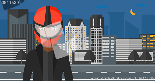 Image of Woman in biker helmet.