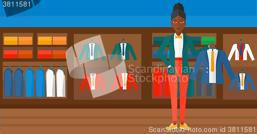 Image of Woman holding jacket.