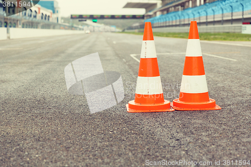 Image of traffic cones on speedway of stadium