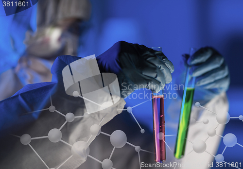 Image of close up of scientist making test in laboratory