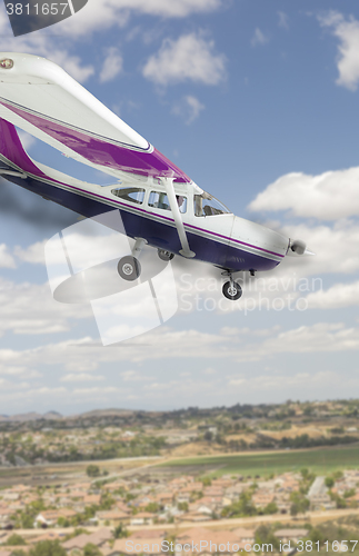 Image of Cessna 172 With Smoke Coming From The Engine Heading Down