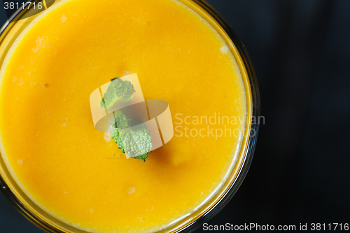 Image of orange smoothie in the glass