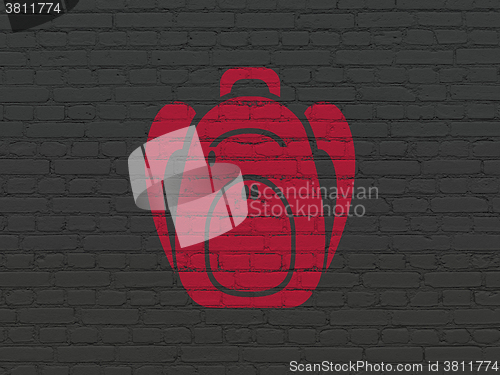 Image of Education concept: Backpack on wall background