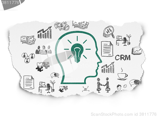 Image of Business concept: Head With Lightbulb on Torn Paper background