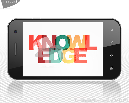 Image of Learning concept: Smartphone with Knowledge on  display