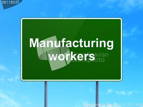 Image of Industry concept: Manufacturing Workers on road sign background