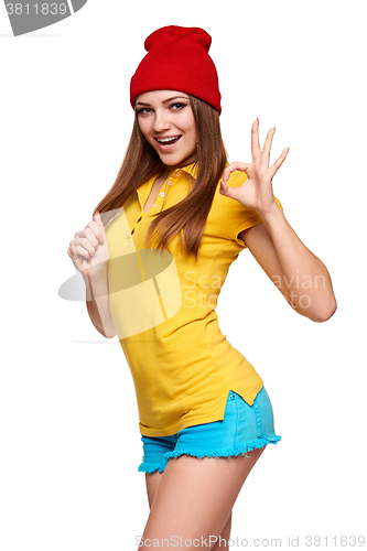 Image of Teen funky girl standing with a frame