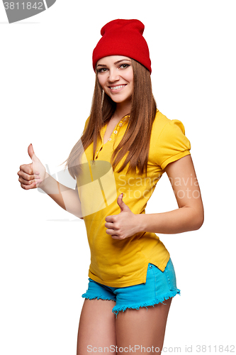 Image of Teen funky girl standing with a frame