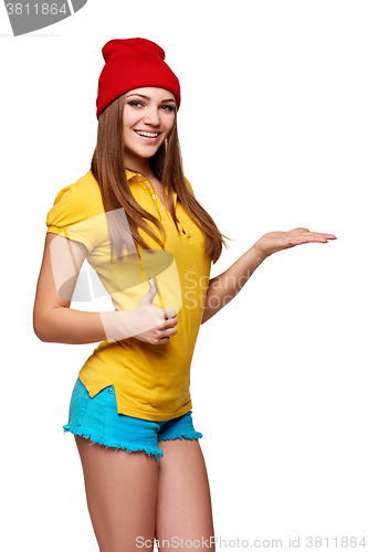 Image of Teen funky girl standing with a frame