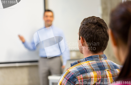 Image of group of students and teacher in classroom