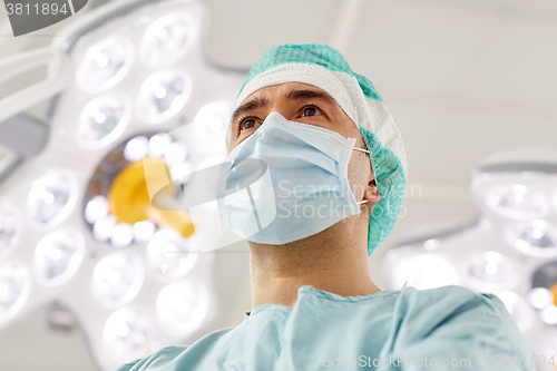 Image of surgeon in operating room at hospital