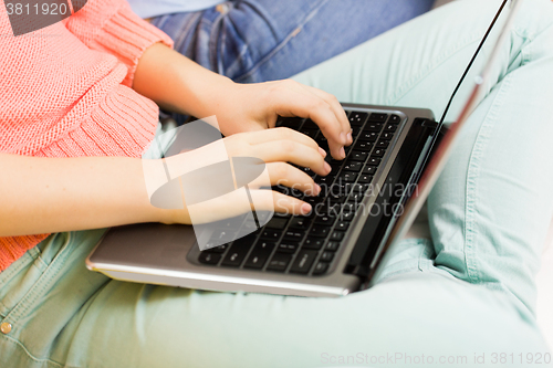 Image of close up of women or friends with laptop at home