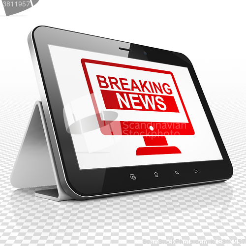 Image of News concept: Tablet Computer with Breaking News On Screen on display