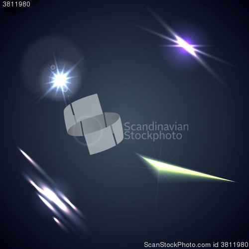 Image of Bright lens flares and glow elements background