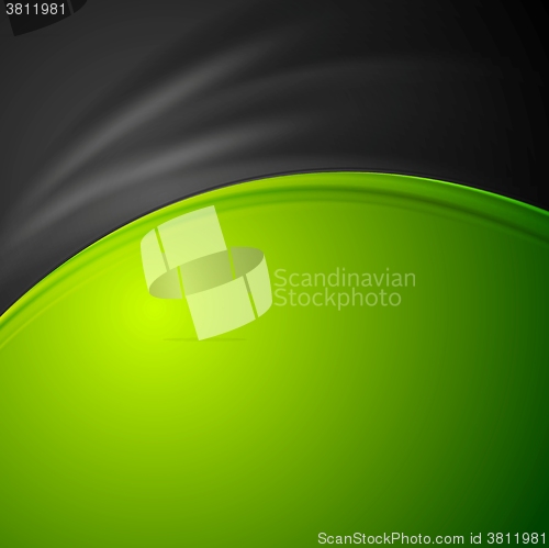 Image of Contrast green and black abstract wavy background