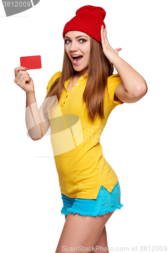Image of Surprised teen funky girl with credit card