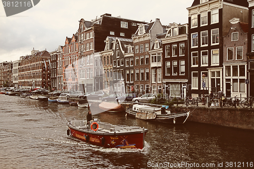Image of AMSTERDAM, THE NETHERLANDS - AUGUST 18, 2015: Street life and ty