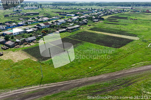 Image of Novikovo village and fields set with potato