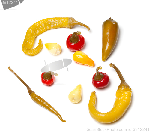Image of Mix of hot marinated turkish peppers on white