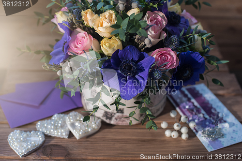 Image of beautiful bouquet flowers and hearts 