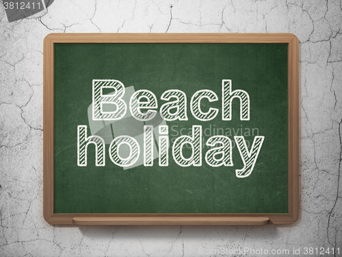 Image of Travel concept: Beach Holiday on chalkboard background