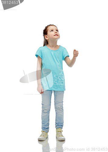 Image of girl looking up and holding something invisible