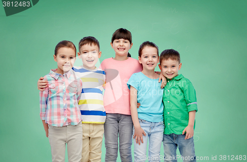 Image of happy smiling little children hugging