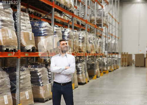 Image of happy man at warehouse