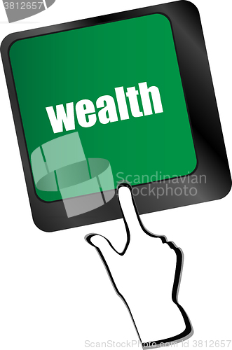 Image of cloud icon with wealth word on computer keyboard key