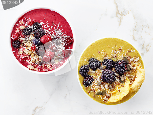 Image of two bowls of breakfast smoothie