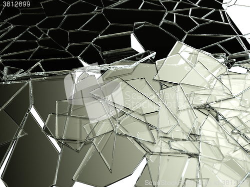 Image of Pieces of splitted or cracked glass on white