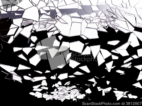 Image of Pieces of shattered glass on black