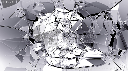 Image of Pieces of splitted or cracked glass on black