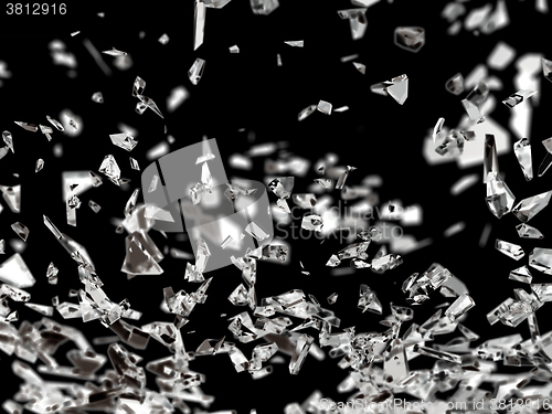 Image of Pieces of splitted or cracked glass isolated on black