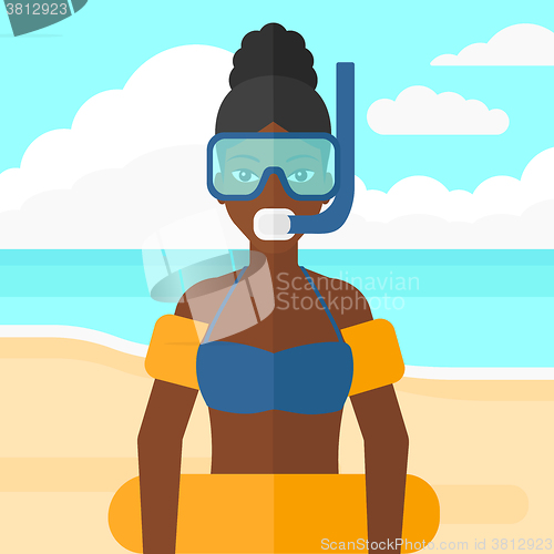 Image of Woman with swimming equipment.